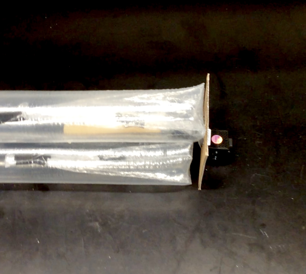 Three tube pnuematic vine robot with a tool mount holding a camera